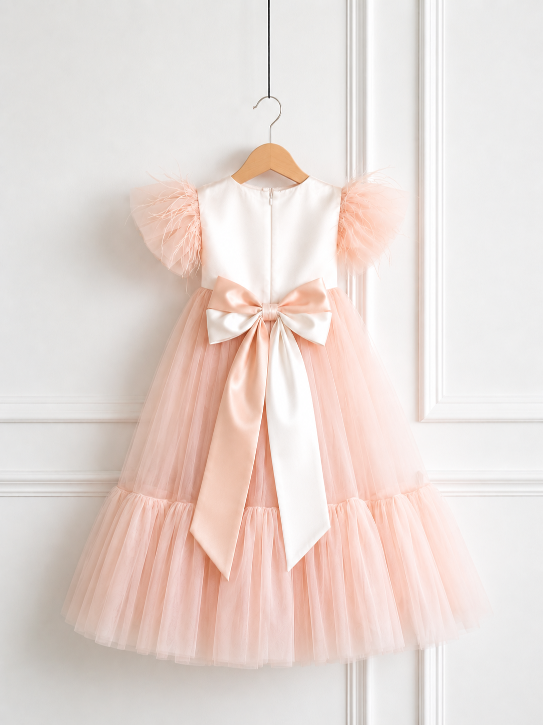 Back view of Lauren Ann blush pink tulle party dress for girls with off-white satin bodice