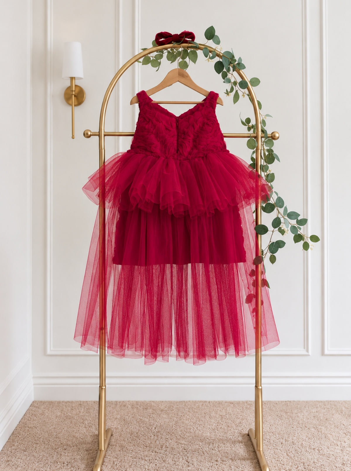 Back view of red 3D rosette birthday dress with satin bow