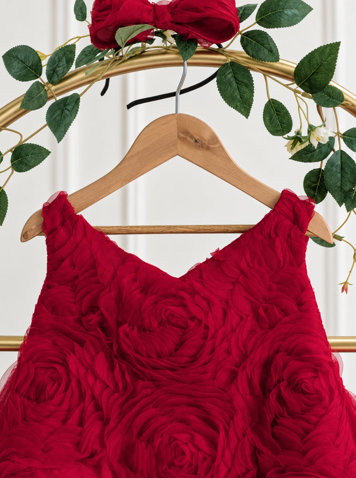 Close-up of red 3D rosette floral bodice