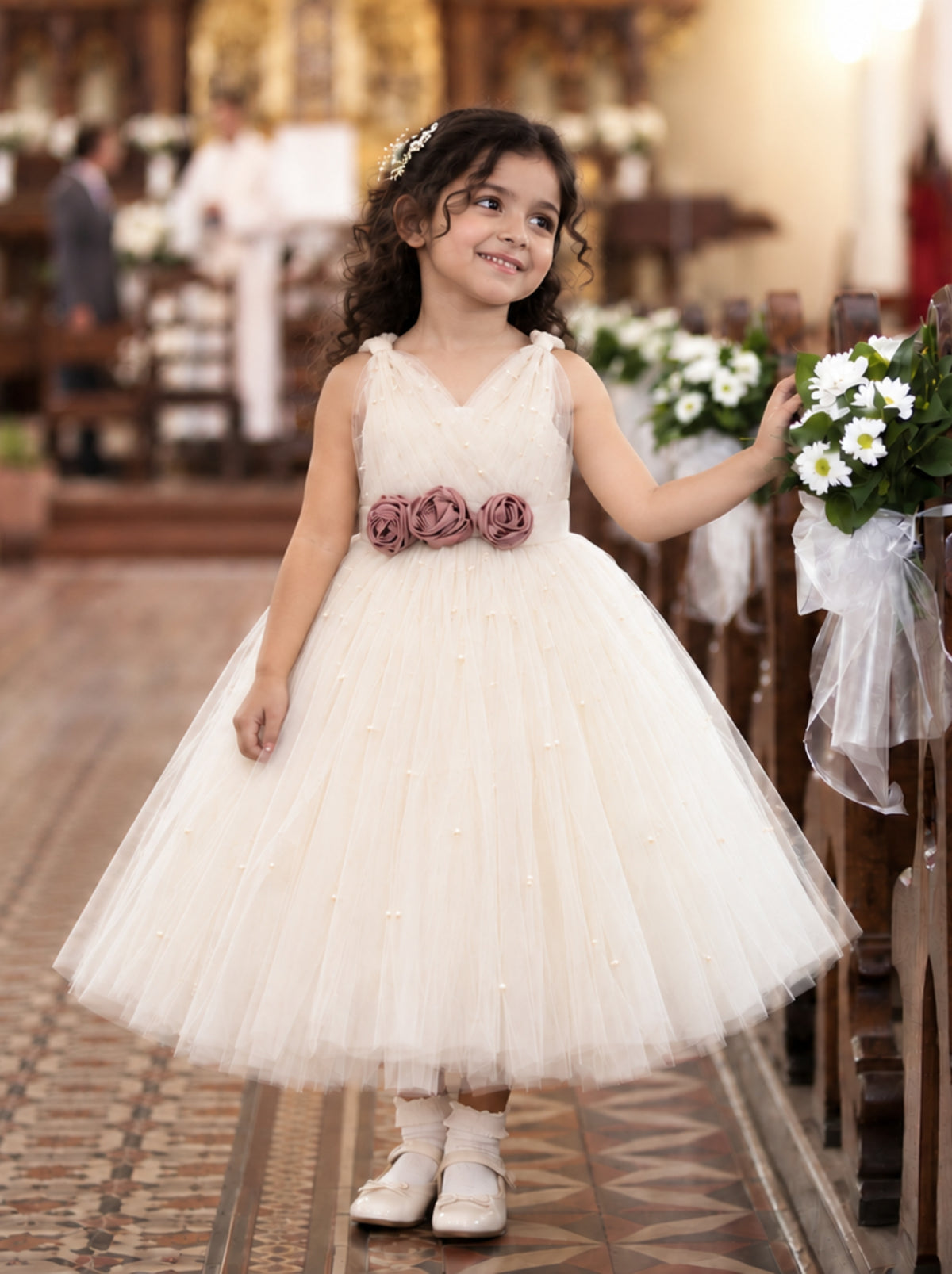 Flower girl in ivory dress