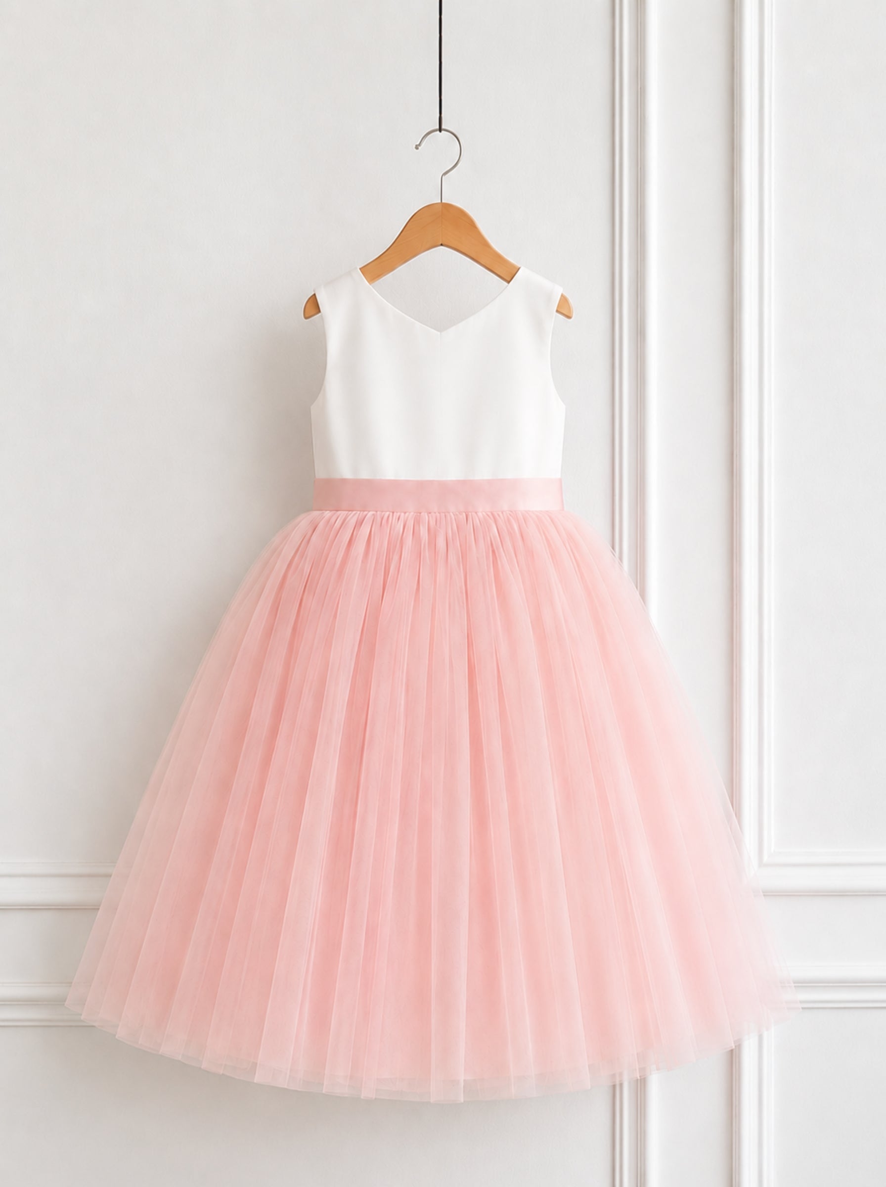 Blush pink flower girl dress for girls with ivory bodice and layered tulle skirt front view