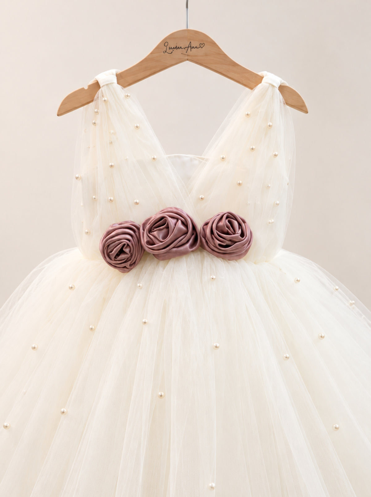 Ivory girls dress with pearl embellished bodice and flowers