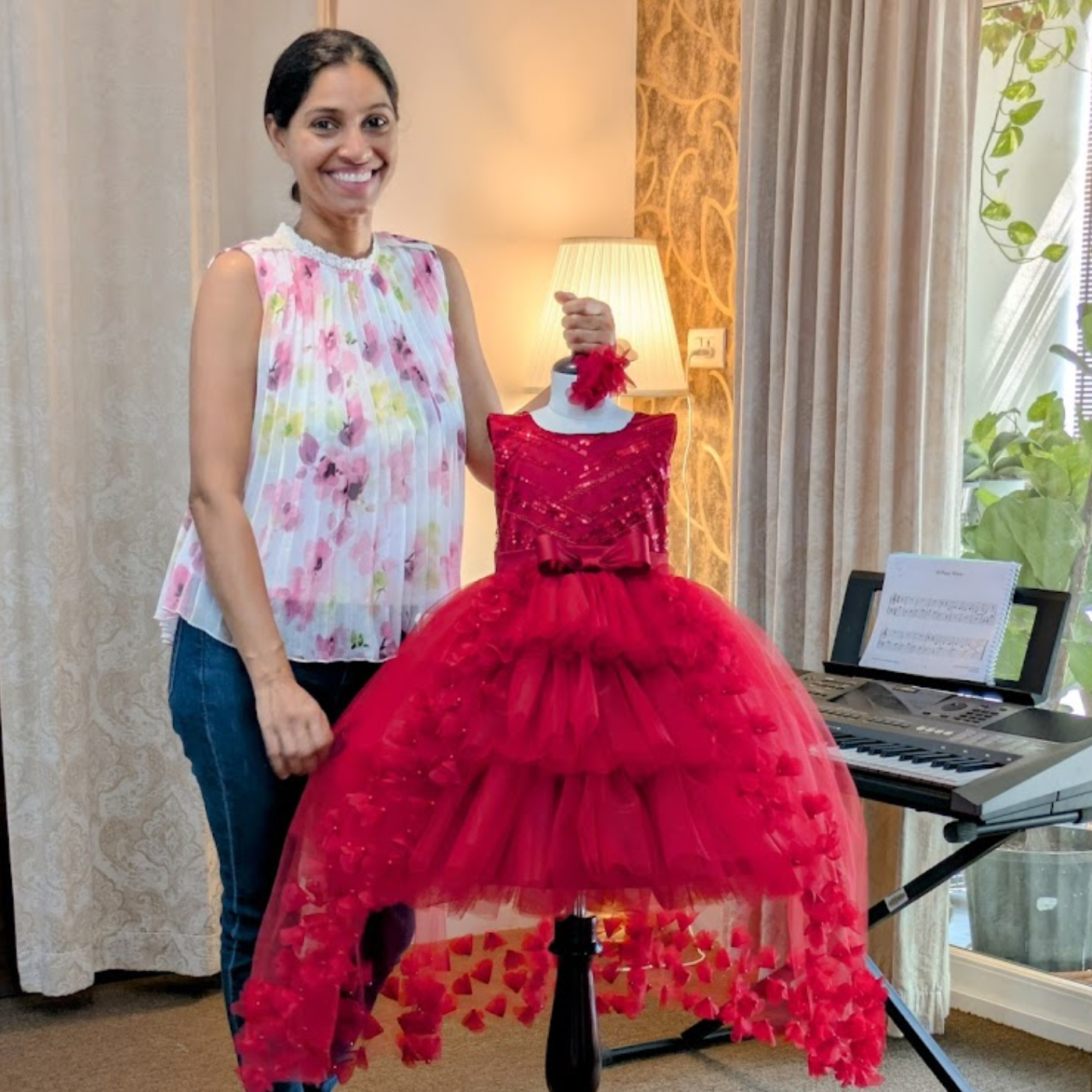 Handcrafted red birthday gown for girls designed by Lauren Ann in Hyderabad