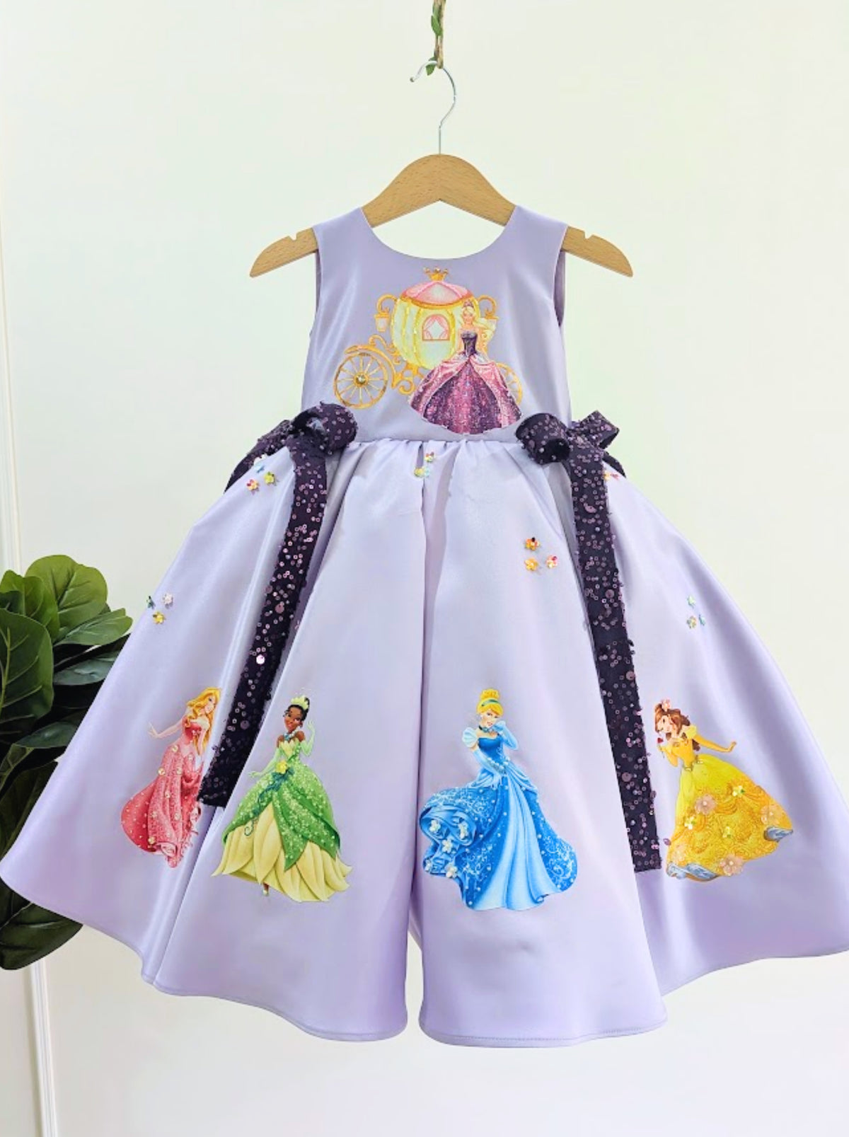 Lavender princess inspired birthday dress for girls with fairytale princess prints and sequin bow details