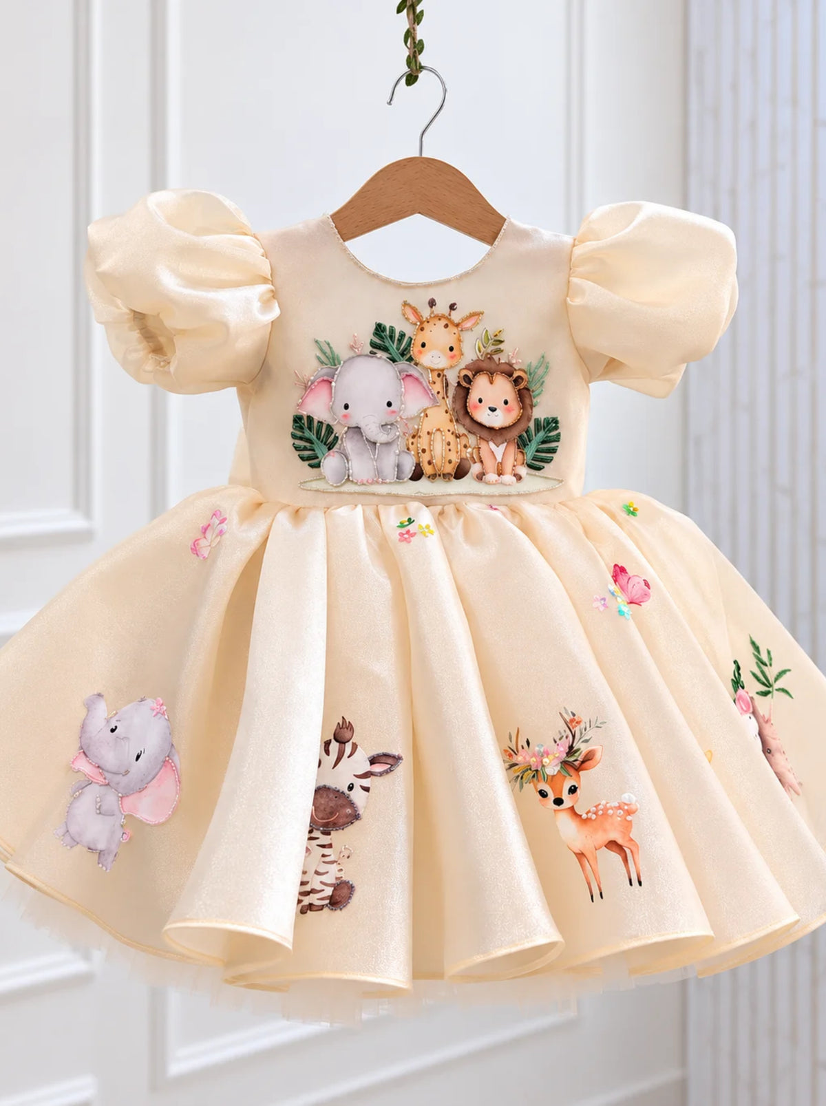 Personalized safari animal birthday dress for girls in cream Duchess Satin with puff sleeves and statement bow