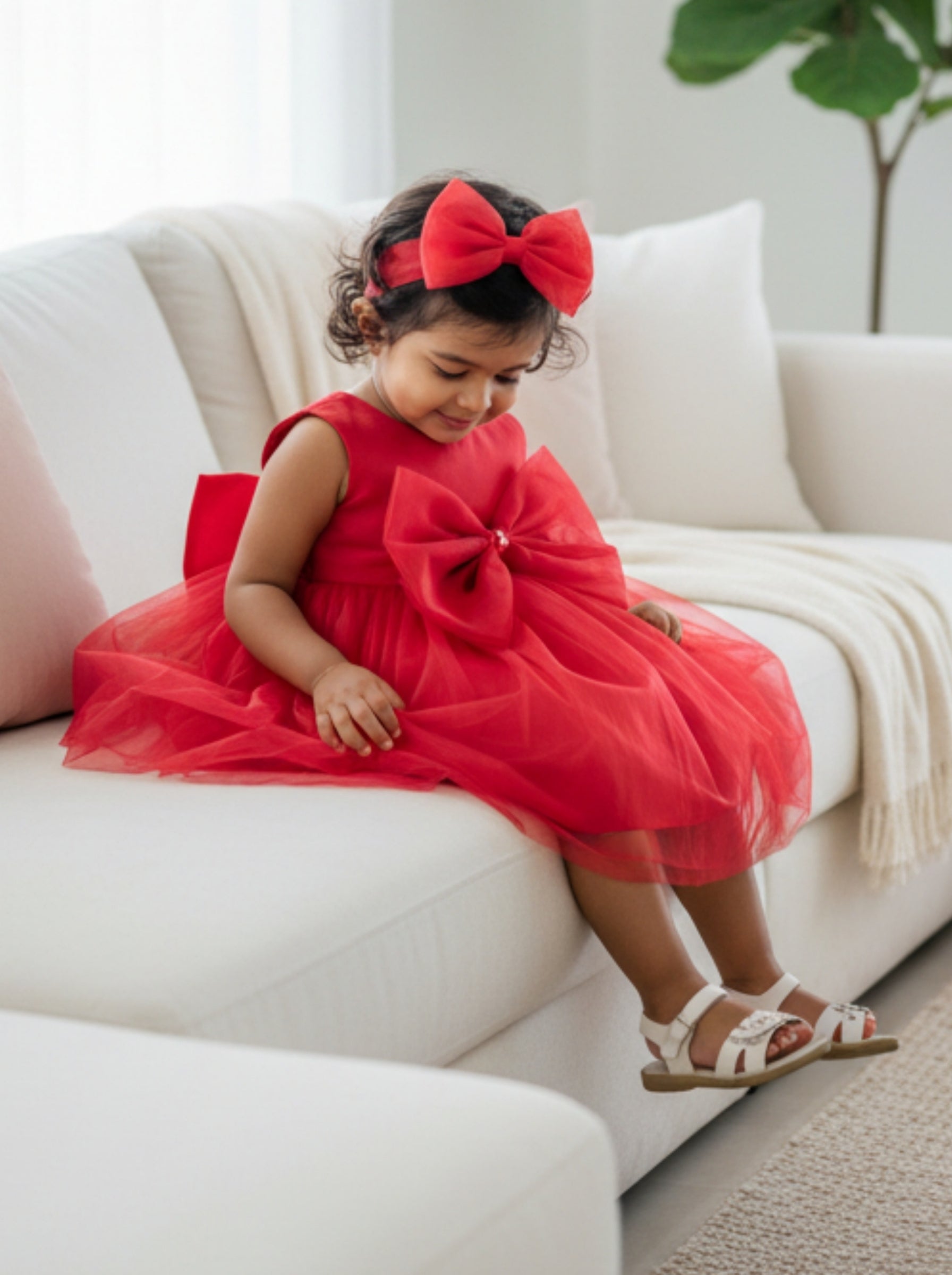 girl wearing a red birthday dress