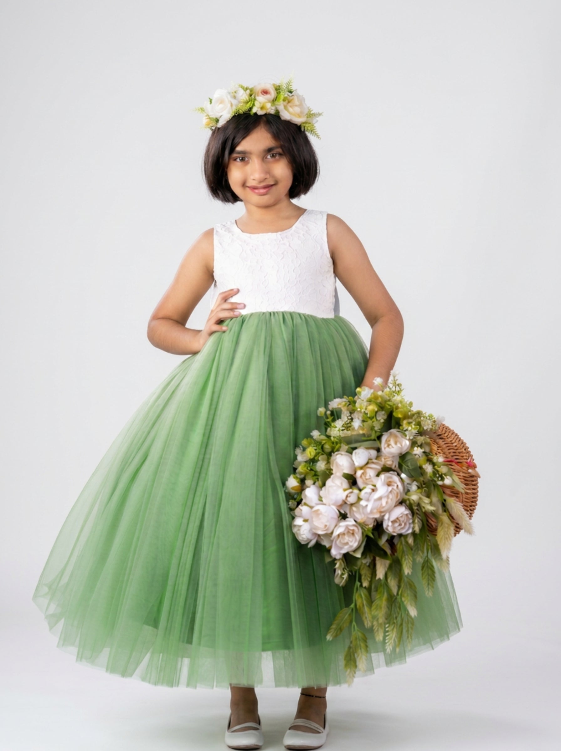 Luxury green tulle party dress for girls, white lace bodice, floral headpiece, perfect for weddings and birthdays in India